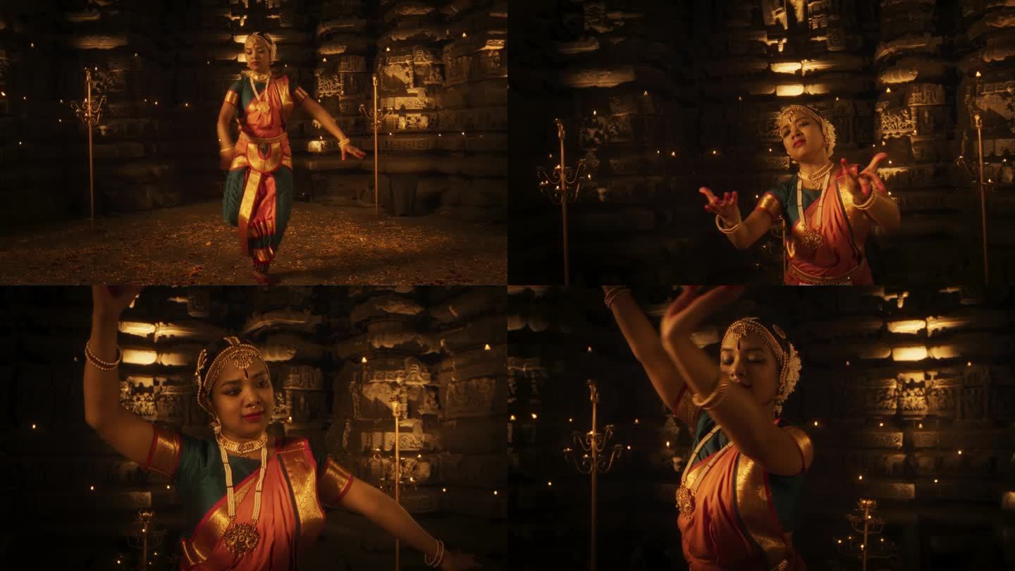 放大一个年轻的充满活力的印度妇女的肖像，在烛光照亮的寺庙里表演传统的民间舞蹈。在历史和精神遗址中展示