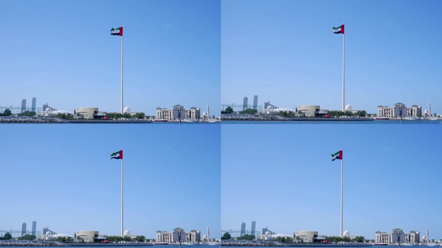 沙迦，阿联酋国旗从沙迦国旗岛上空的一根巨大杆子上飘扬。阿联酋国旗日，沙迦国旗岛。从远处看