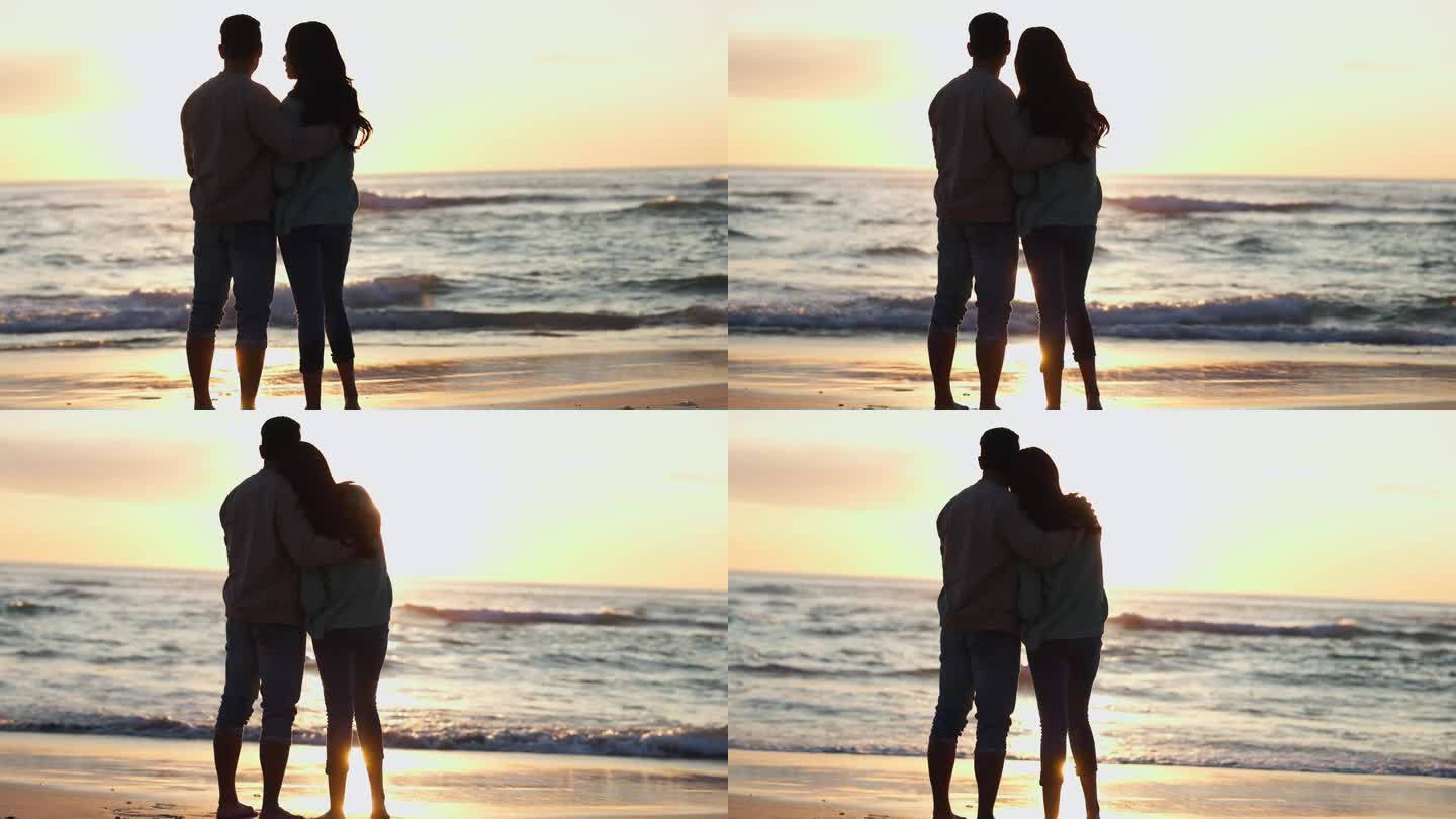 剪影，情侣和拥抱在海滩上，日出和浪漫的假期在迈阿密快乐的夏天和爱。旅行假期，男人和女人一起看日落和海