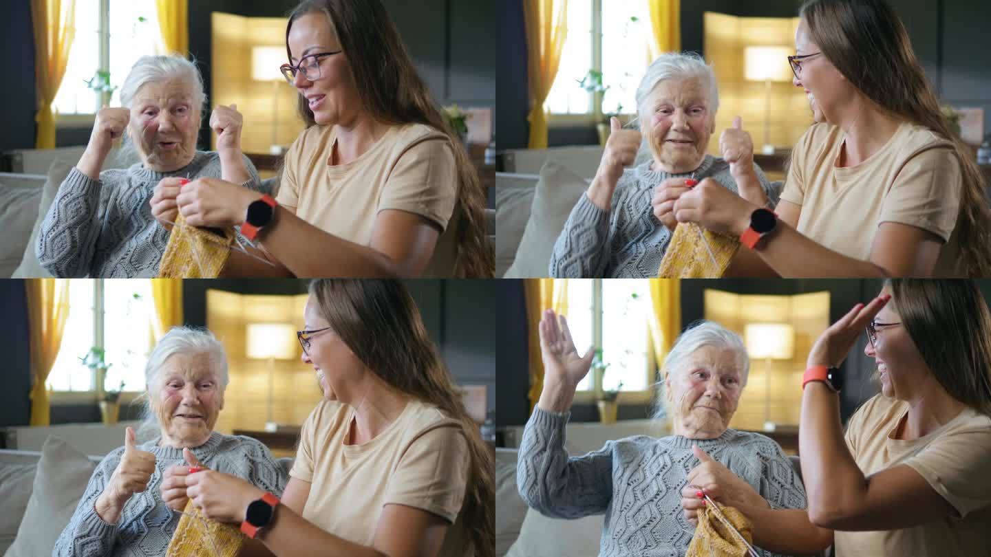 80年代，祖母为孙女织毛衣的成功而高兴，竖起大拇指，激励教织针的孙女