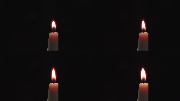 在黑暗中用一根蜡烛点燃另一根蜡烛