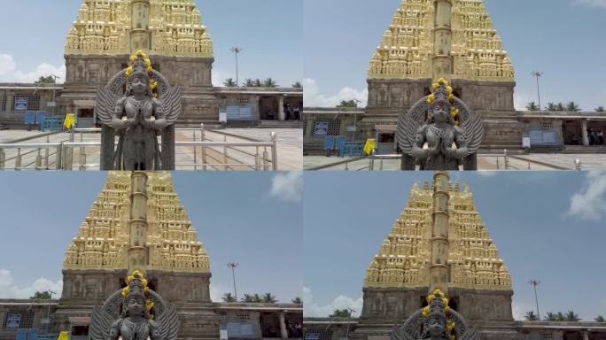 在印度卡纳塔克邦的Belur，一座美丽的石雕“Garuda”或毗瑟奴神对着寺庙塔被称为Gopuram