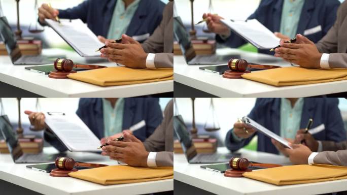 近距离生意人或律师在办公室里签订合同，进行交易，经典的商务活动。
