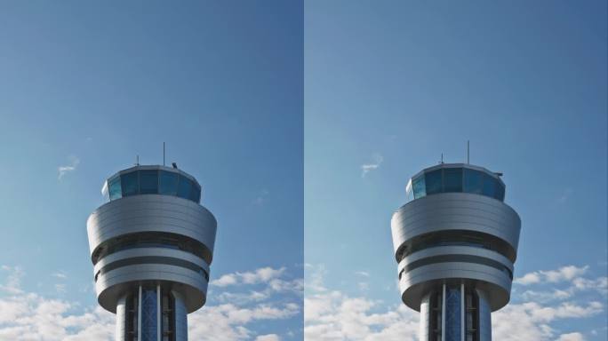 机场指挥塔顶着多云的天空，控制航管大楼的空中交通4K视频