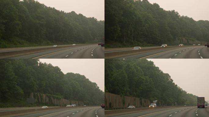 道路上的空气污染和大气问题。雾霾下的公路旅行，马里兰州，POV汽车驾驶