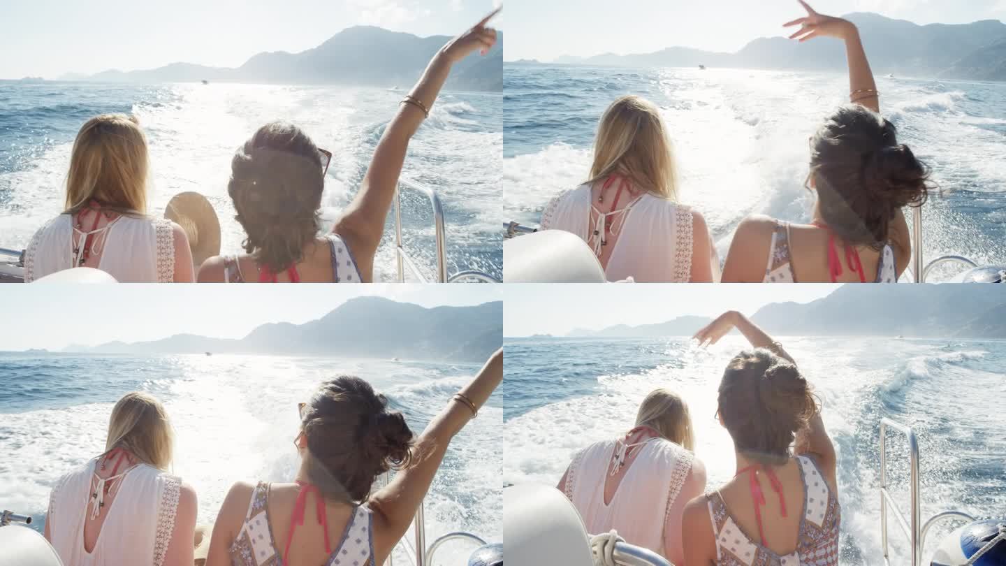 在日落时分在船上跳舞的女人，在游艇上做愚蠢的自由式舞蹈，在派对船上享受日落欧洲暑假旅行度假冒险在意大