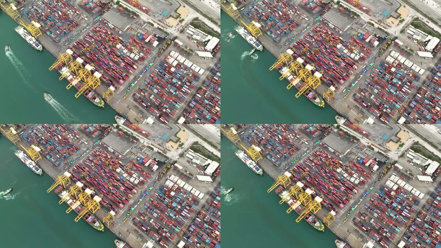 4k延时工作商业港口用起重机装卸集装箱船进出口货物，用拖车将货物配送给客户和经销商;