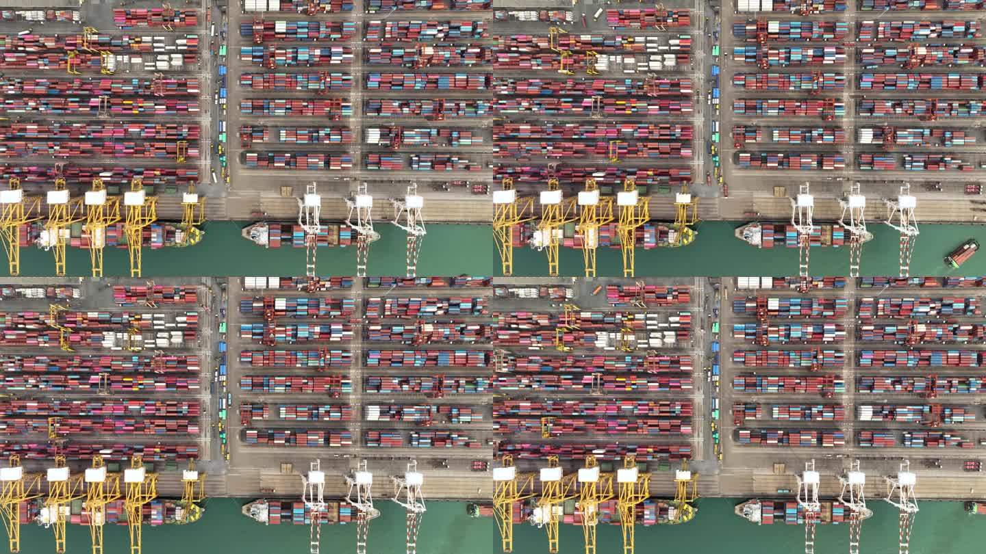 4k延时工作商业港口用起重机装卸集装箱船进出口货物，用拖车将货物配送给客户和经销商;