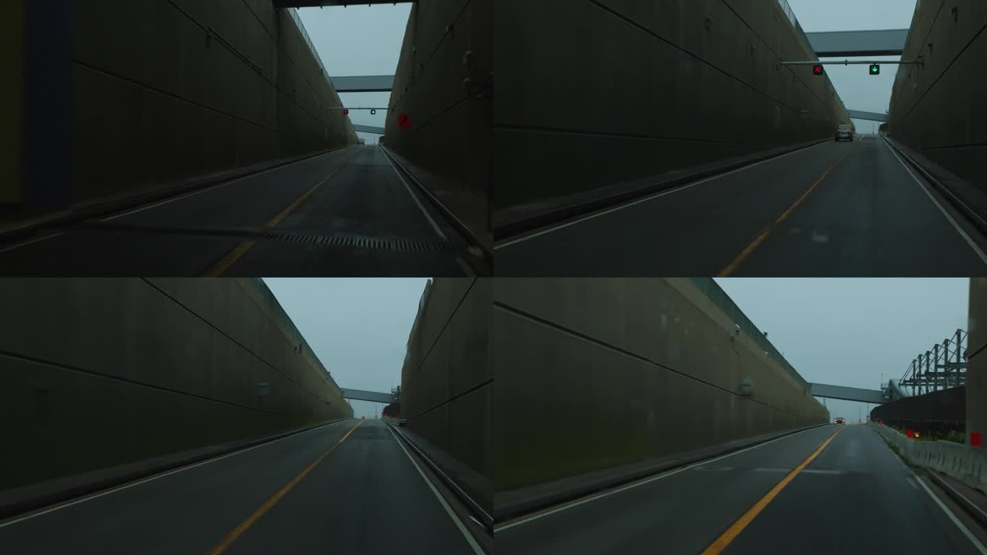 黑暗的隧道和在极端天气下行驶的汽车。驾驶牌照，POV汽车司机