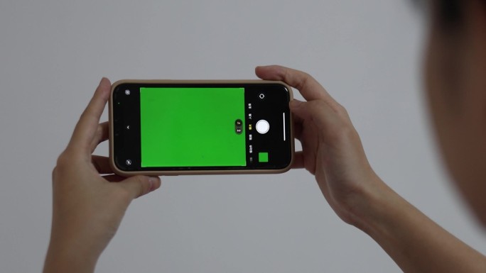 绿幕手机拍照 举起手机拍照绿幕