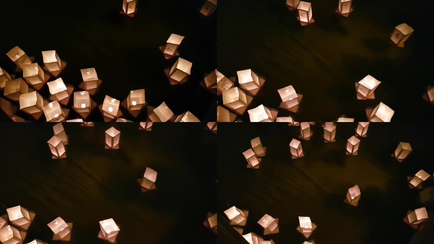 日本人用漂浮在水面上的纸灯笼纪念原子弹爆炸