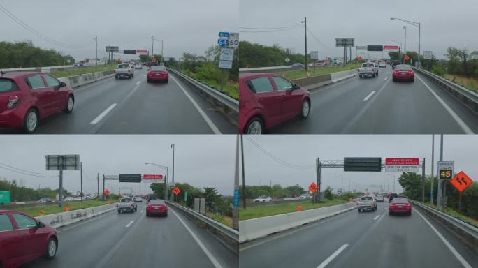 在下雨的桥路上行驶的汽车。汉普顿路的大灯穿过雨水，弗吉尼亚州。驾驶牌照，POV汽车司机