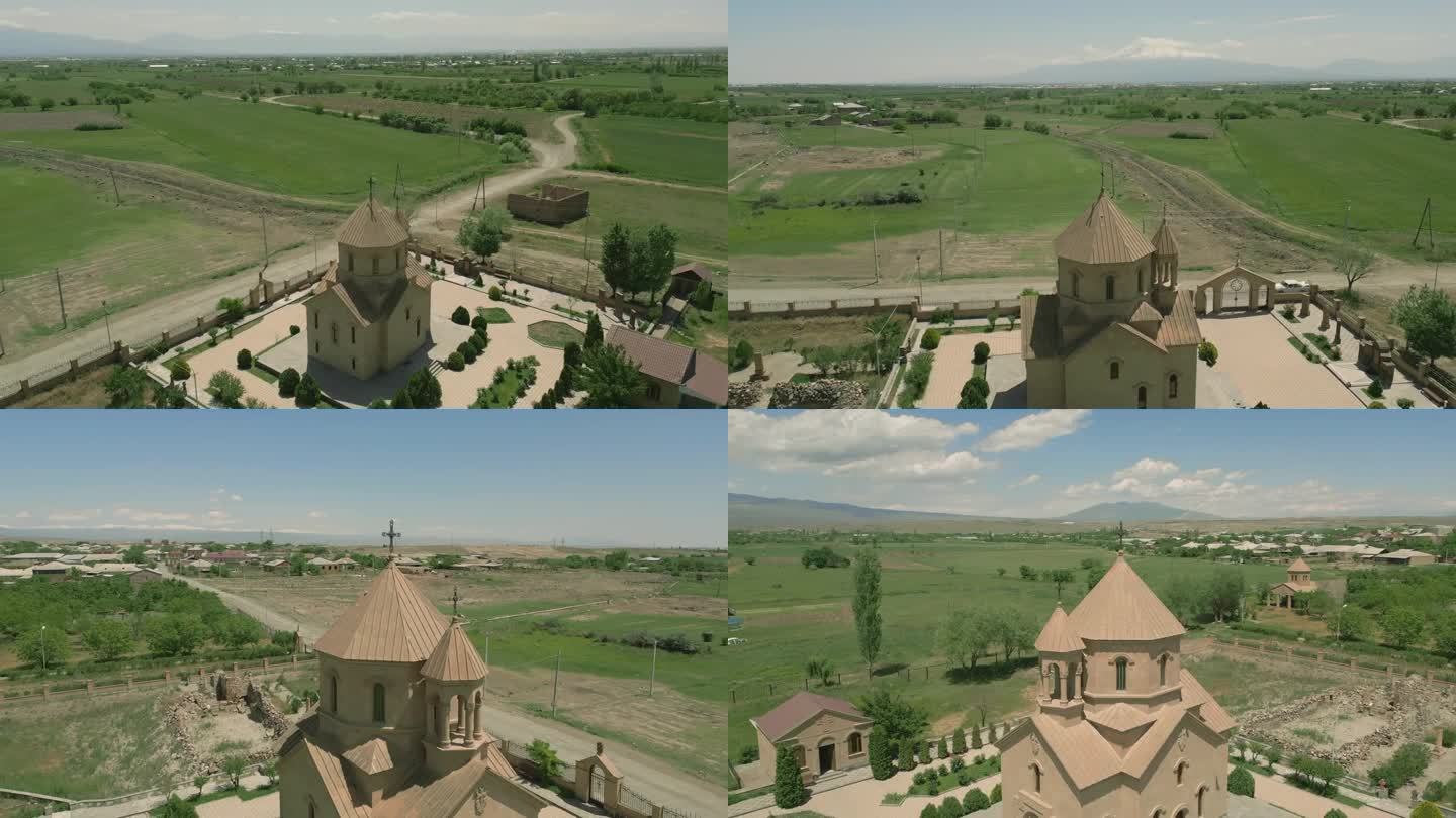亚美尼亚绍姆扬的圣母玛利亚教堂。房子、田野、山脉。