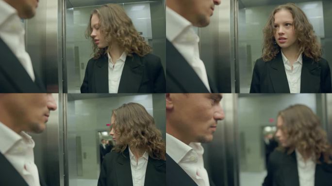穿着职业装的女孩走进电梯。