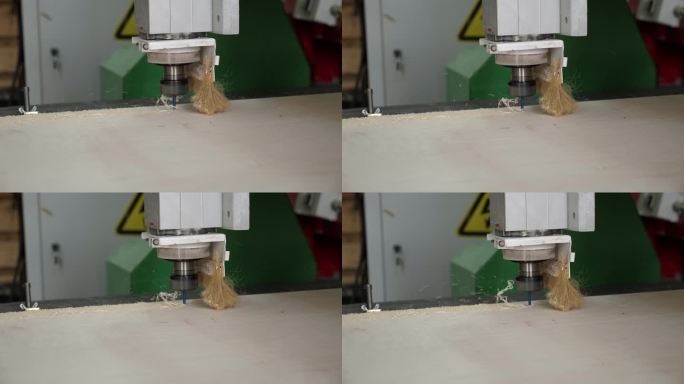 在木工车间用钻孔刀从胶合板上切割零件。