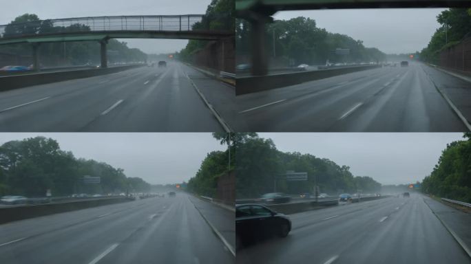 驾车穿越风暴:在暴雨中行驶在被洪水淹没的高速公路上的汽车，弗吉尼亚州。驾驶牌照，POV汽车司机