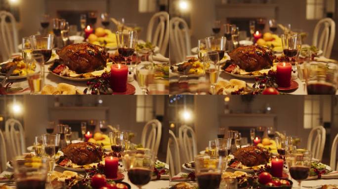 美味的火鸡特写，在节日的餐桌上，烤炉里还冒着热气。美味的饭菜和节日装饰准备家庭晚餐在家里庆祝感恩节或