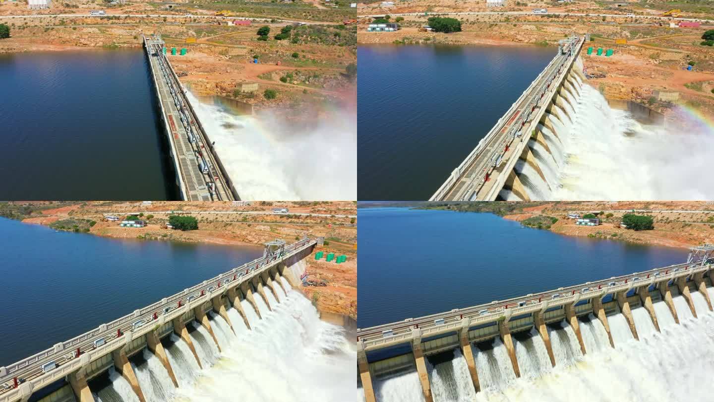 无人机，水坝和彩虹湖的水用于发电，可再生能源或可持续电力。南非的水电、桥梁和河流、瀑布或防洪闸鸟瞰图
