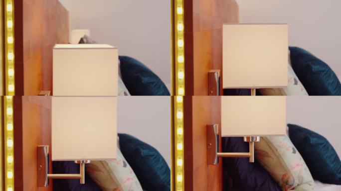 一张带灯的内置LED床头板的床的缓慢下降镜头