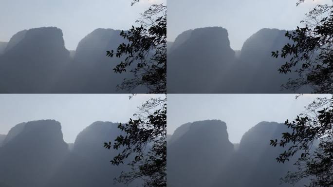 阳光山峰树叶峡谷丁达尔光耶稣光