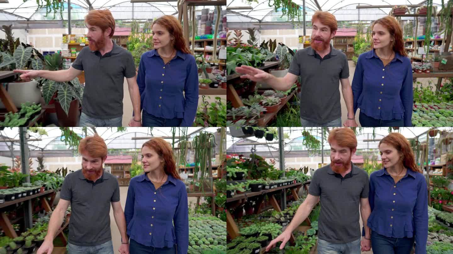 一对热情的红发夫妇在当地花店购买植物。人们走过植物店
