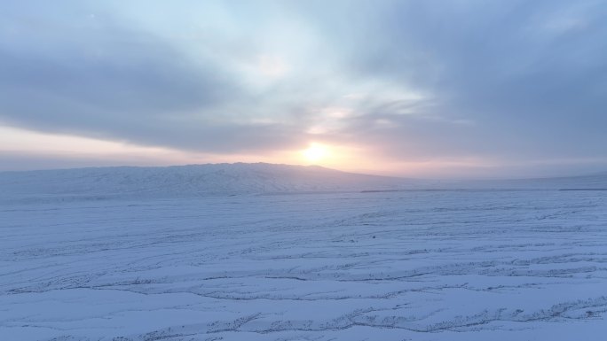 4K一望无际雪景夕阳航拍