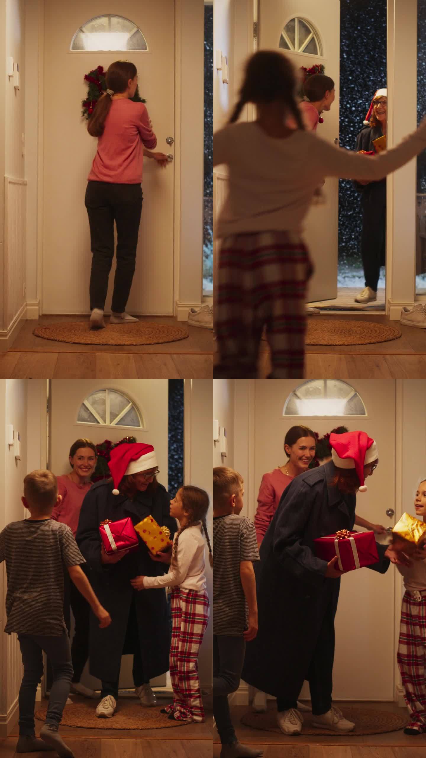 垂直画面:年轻的母亲在门口见到祖父母，家里装饰着花环，小男孩和小女孩带着圣诞礼物跑去见他们的祖母