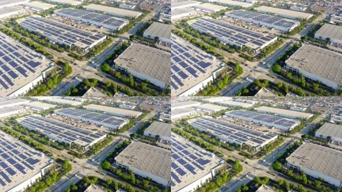 洛杉矶附近工业城市的无人机视图，仓库，航运和太阳能电池板