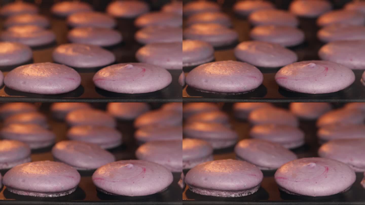 延时拍摄的视频展示了在烤箱中烘烤自制紫色马卡龙饼干