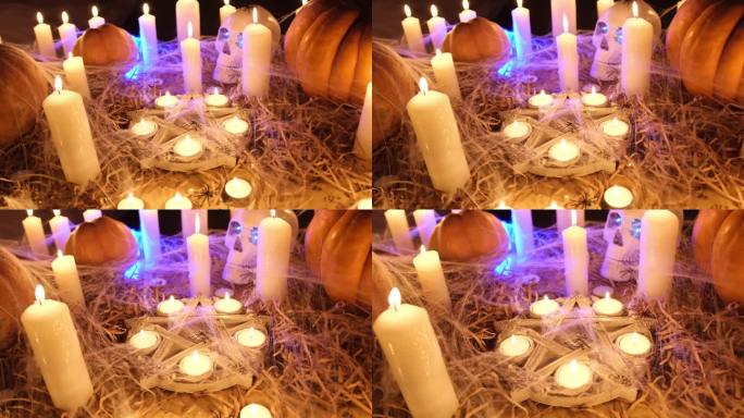 特写，神秘的五角星与闪烁的蜡烛和传统的南瓜接近跟踪镜头。