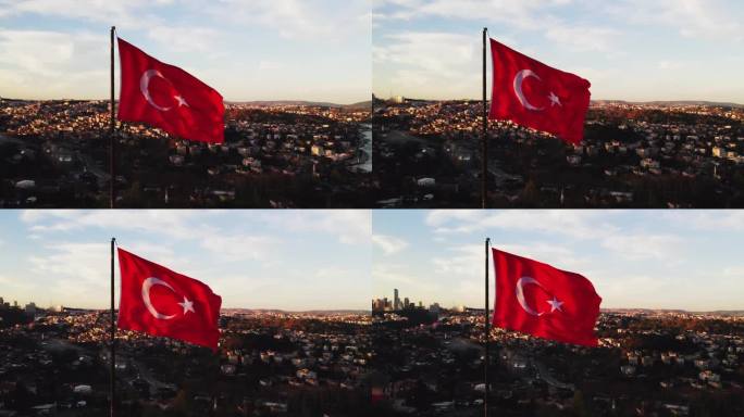 土耳其国旗在风中飘扬，背景是博斯普鲁斯河