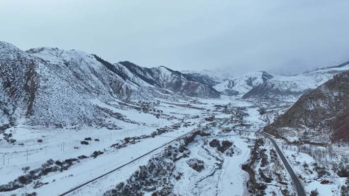高清新疆阿克苏塔村雪景航拍