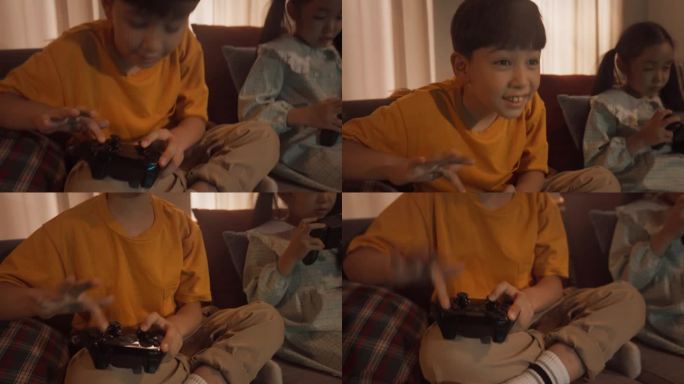 可爱的兄弟姐妹在舒适的客厅沙发上的游戏机上玩电子游戏。韩国兄妹在晚上一起玩游戏。孩子们放学后在家玩得