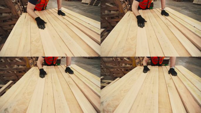 木匠检查转化后的木制品的质量，以完成出口和加工成其他家具