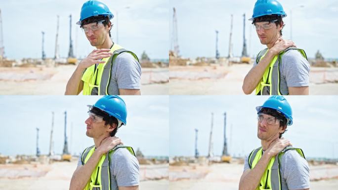 年轻的西班牙裔建筑师在工地遭受颈椎疼痛