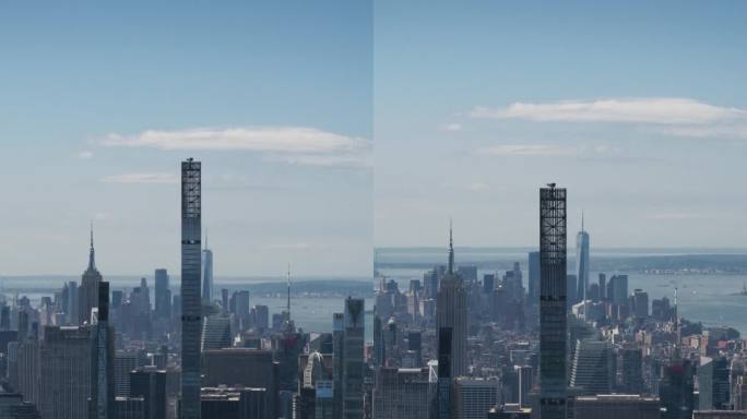 垂直屏幕:阳光明媚的天气纽约市空中俯瞰中央公园和曼哈顿中城摩天大楼。电影无人机视角的城市天际线与略多