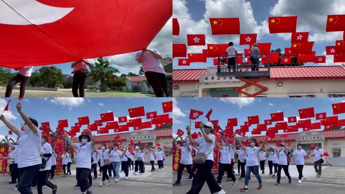 香港市民拉巨幅区旗载歌载舞庆回归迎国庆