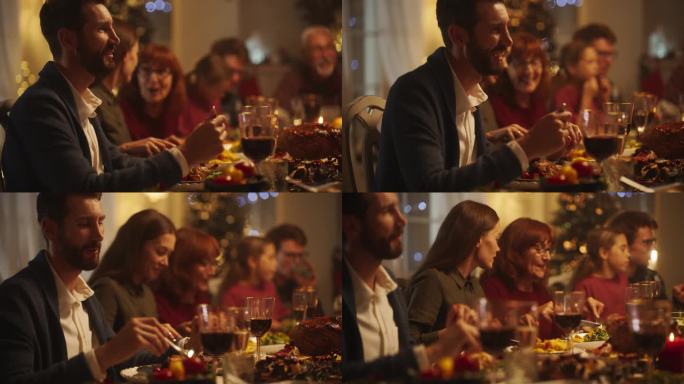 老人和年轻的男人和女人坐在一起在一个舒适的圣诞晚餐庆祝在家里的肖像。每个人都面带微笑，在装饰精美的客