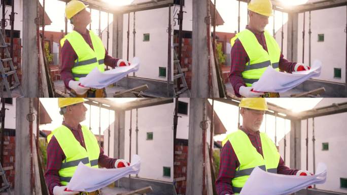 建筑工人检查图纸外国人施工看图纸