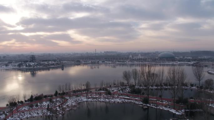 磁县城市公园航拍早晨 雪天如意湖