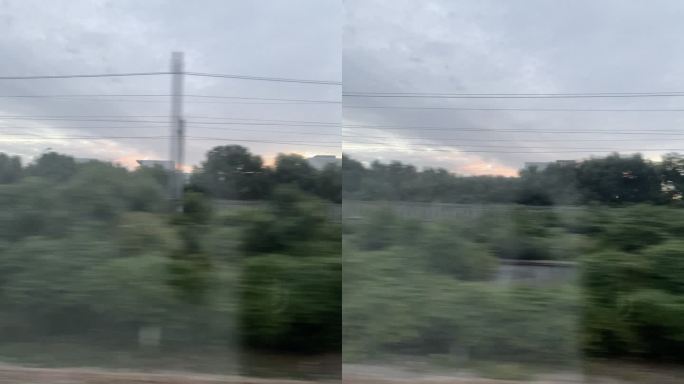 傍晚行驶中的火车窗景