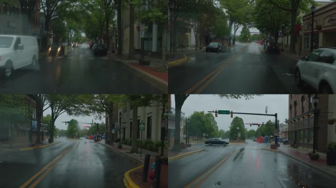 雨中黑暗中的车灯。道路被暴雨浸湿了。汽车行驶在潮湿的W洛克曼街在多佛，德。驾驶牌照，道路的POV