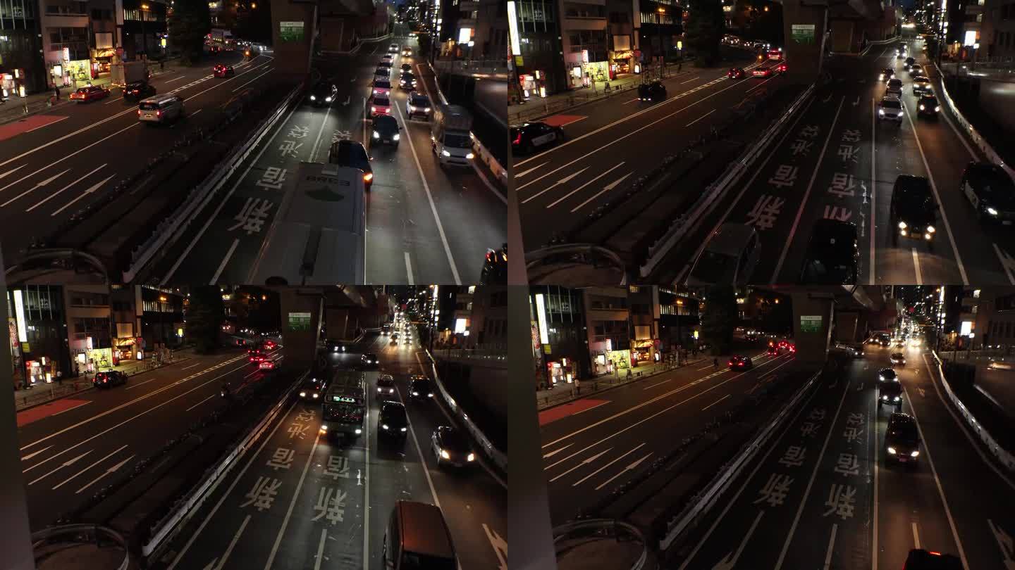 东京，日本:夜间街道交通的延时拍摄。