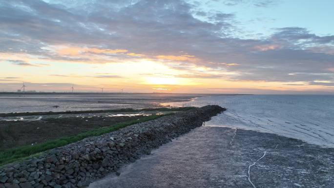 航拍夕阳海边慈溪大海