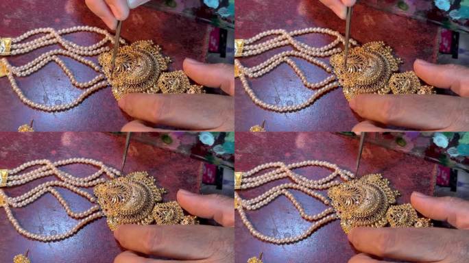制作Meenakari黄金首饰的过程。手工制作Meenakari珠宝的复杂过程。Meenakari或