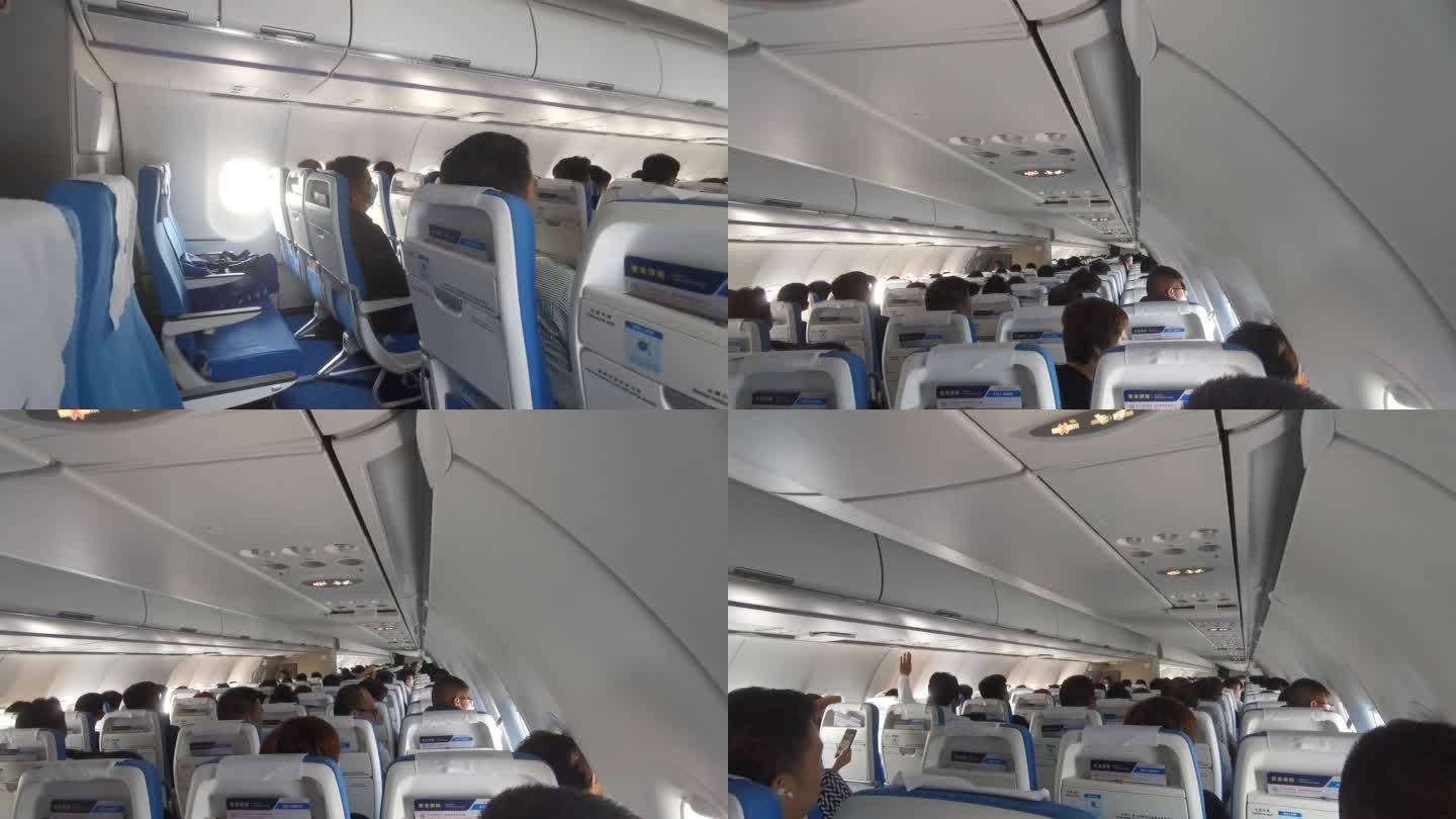 飞机上乘客 乘客 旅客 机舱内