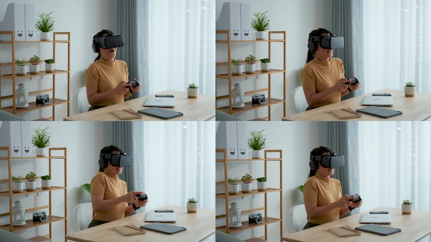 亚洲女性戴着VR头显，用操纵杆在家里办公室玩电子游戏。