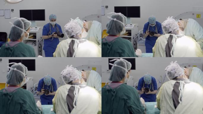 摄影师与外科医生和护士在手术室工作