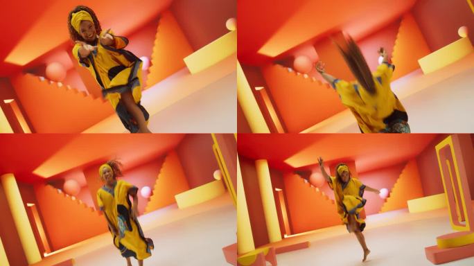 动态摄影机跟随非洲女舞者表演现代舞蹈的动作。美丽的黑人妇女在一个充满活力的舞蹈工作室与彩色抽象几何形