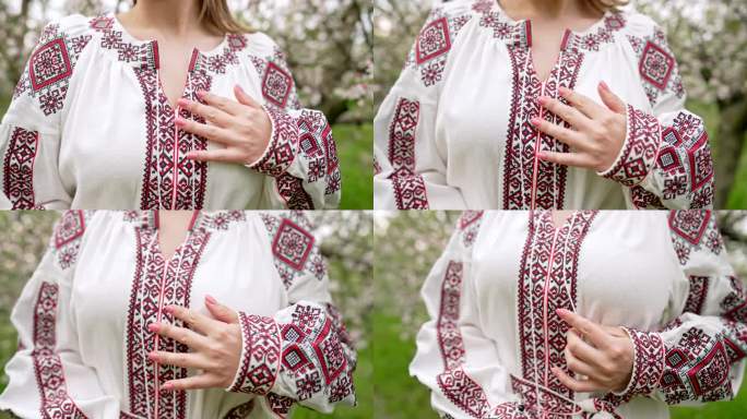 一名妇女正在展示服装上美丽的刺绣装饰细节。乌克兰民族服装，质地，设计，民间，手工工艺针线活的理念
